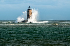 Great Waves Breaking Around Whaleback Lighthouse in Maine